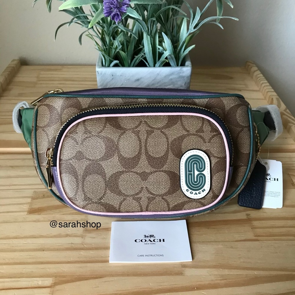 COACH Signature Canvas Belt Bag in Brown with Pink Trim